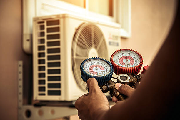Professional Air Conditioning Service technician working in Sherman, IL